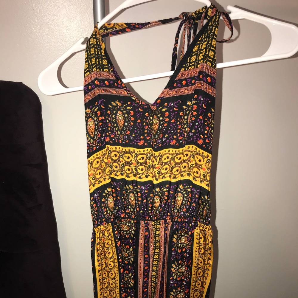 Boho theme pantsuit with flare legs.